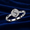 Elegant Silver-Tone Infinity Knot Ring with Sparkling Crystal Accents for Women